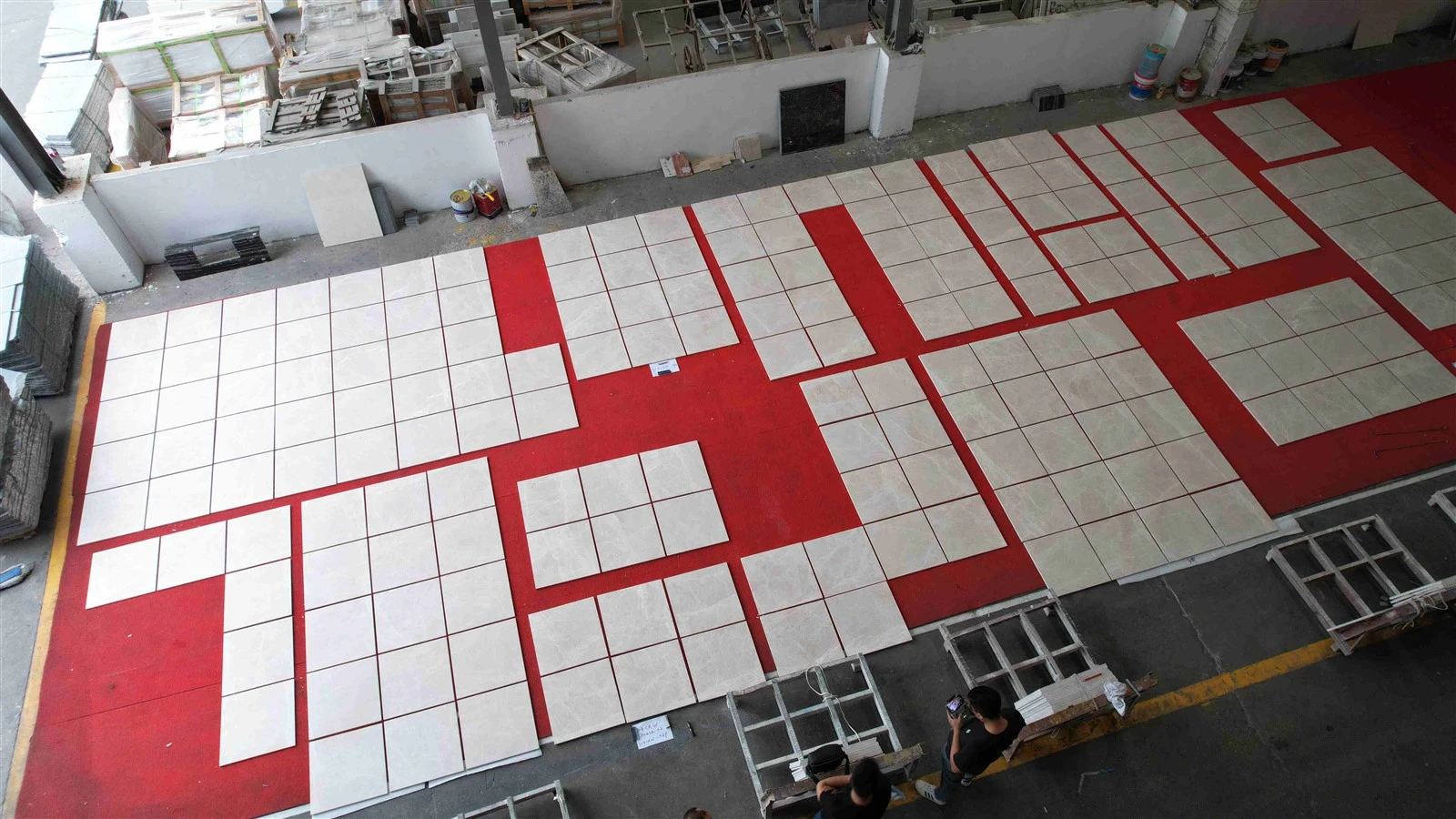 Factory dry-lay inspection of honed Agora Beige Marble tiles arranged by installation area before packing for a Singapore residential project. Factory dry-lay inspection of honed Agora Beige Marble tiles arranged by installation area before packing for a Singapore residential project.