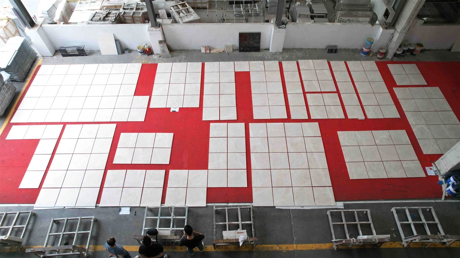 Overhead view of numbered Agora Beige Marble floor and wall tiles grouped for colour, veining and dimensional review at Landiview Stone. Overhead view of numbered Agora Beige Marble floor and wall tiles grouped for colour, veining and dimensional review at Landiview Stone.